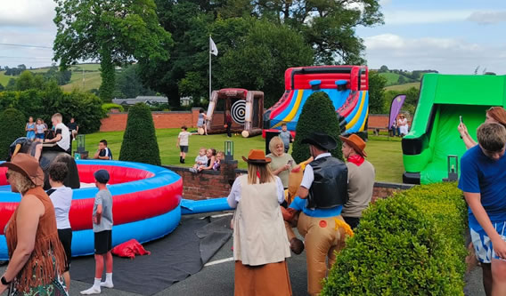 Corporate fun day hire with inflatables in Wales