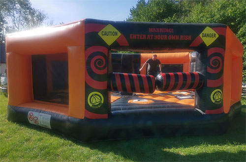 inflatable Total wipeout sweeper hire carmarthenshire